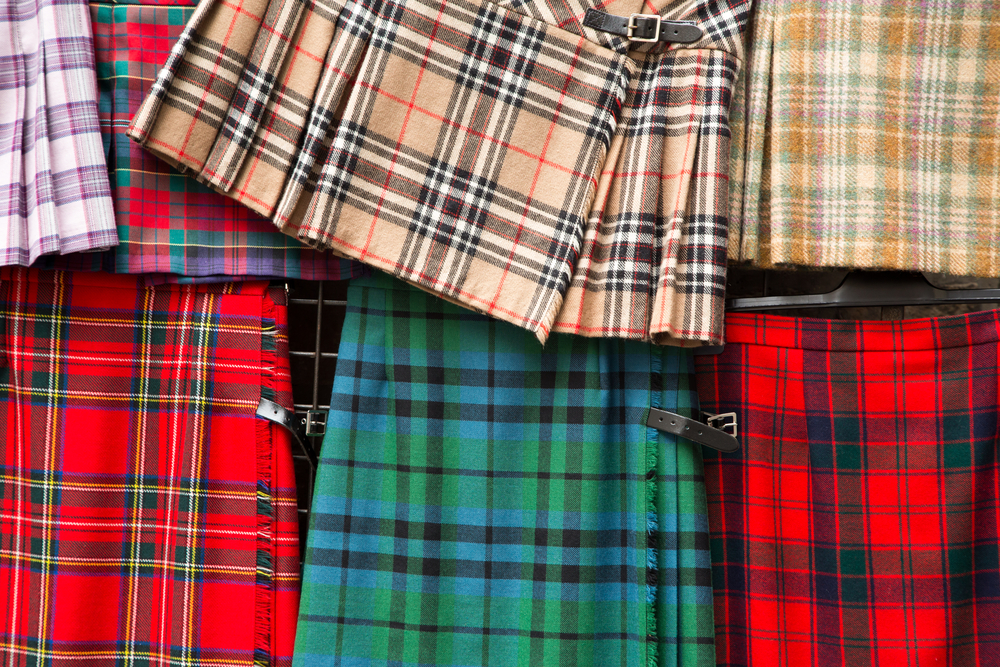 Detail of a variety of tartan kilts